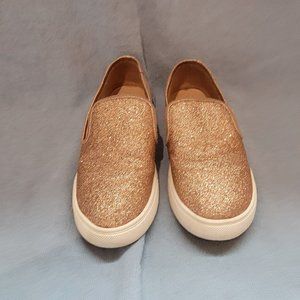 Like new slip on shoes  gold.glittery color size 1